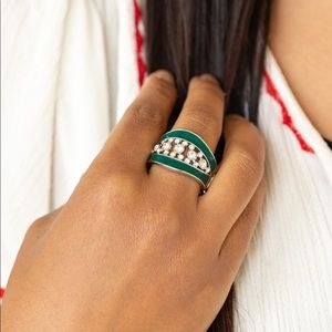 Green ring with diamonds and it’s a one size fit
